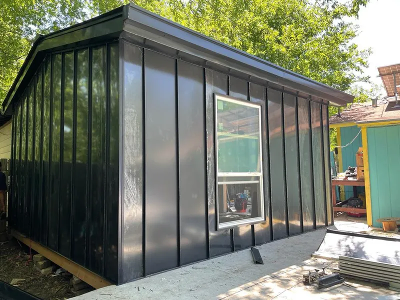 Black standing seam metal wall panels for Metal Roof Installation in Mountainside